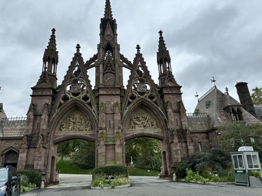 Ornate Gothic stone gateway at a cemetery entrance